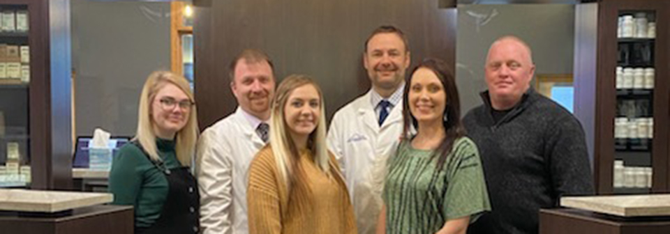 Chiropractor Hutchinson KS Dr. Schroeder With Team Chiropractor Hutchinson KS Dr. Schroeder With Team